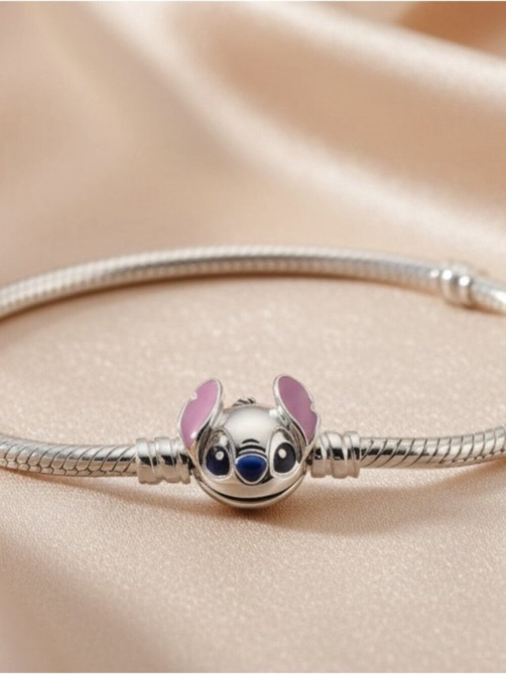 Silver Charm Bracelet with Pink-Eared Stitch Charm